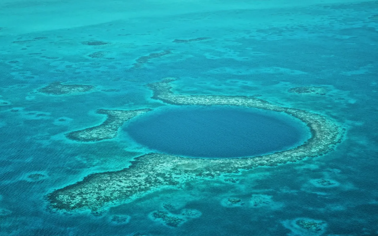 Aerial view of the Great Blue Hole in Belize, illustrating the jurisdiction